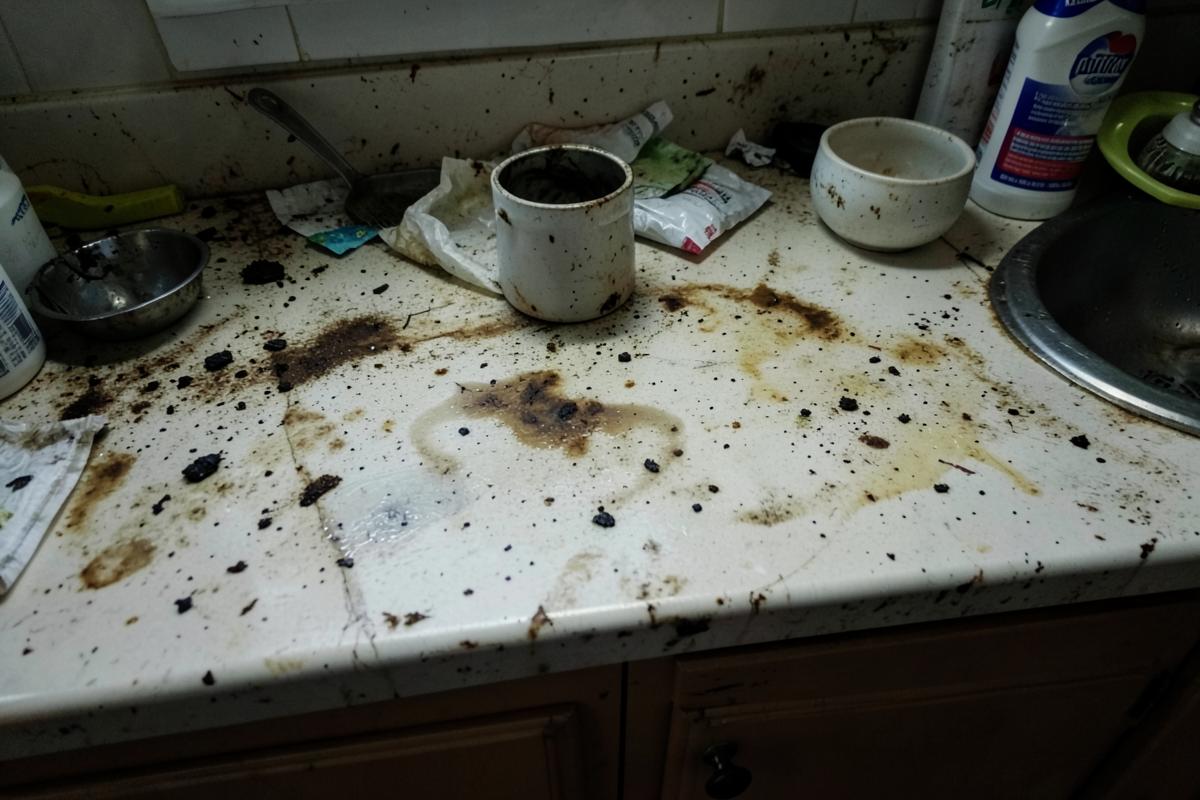 Stained kitchen countertop before cleaning